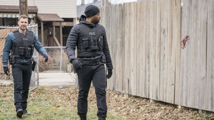 CHICAGO P.D. -- "Chasing Monsters" Episode 513 -- Pictured: (l-r) Patrick John Flueger as Adam Ruzek, LaRoyce Hawkins as Kevin Atwater -- (Photo by: Matt Dinerstein/NBC)