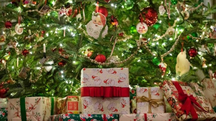 Decorative presents sit under a Christmas tree in the living room.Xxx Hgs 2838 Jpg Usa Dc