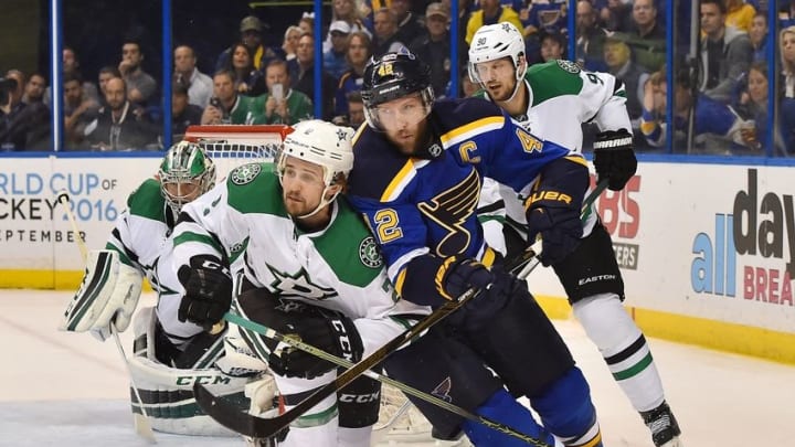 May 9, 2016; St. Louis, MO, USA; Dallas Stars defenseman Kris Russell (2) and St. Louis Blues center David Backes (42) battle for position on the Ice during the second period in game six of the second round of the 2016 Stanley Cup Playoffs at Scottrade Center. Mandatory Credit: Jasen Vinlove-USA TODAY Sports