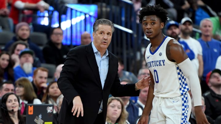 LAS VEGAS, NEVADA – DECEMBER 18: Head coach John Calipari of the Kentucky Wildcats talks with Ashton Hagans #0 during their game against the Utah Utes in the annual Neon Hoops Showcase benefiting Coaches vs. Cancer at T-Mobile Arena on December 18, 2019 in Las Vegas, Nevada. The Utes defeated the Wildcats 69-66. (Photo by Ethan Miller/Getty Images)