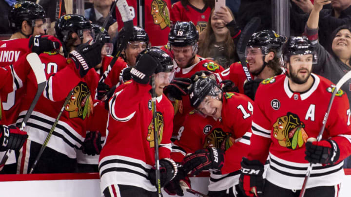 CHICAGO, IL - APRIL 05: Chicago Blackhawks left wing Chris Kunitz (14) celebrates his goal with teammates on the bench during a game between the Dallas Stars and the Chicago Blackhawks on April 5, 2019, at the United Center in Chicago, IL. (Photo by Patrick Gorski/Icon Sportswire via Getty Images)