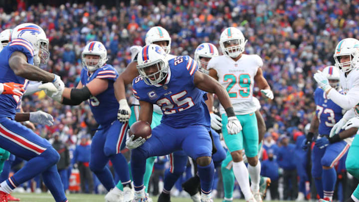 BUFFALO, NY - DECEMBER 30: LeSean McCoy #25 of the Buffalo Bills runs with the ball for a touchdown in the third quarter during NFL game action against the Miami Dolphins at New Era Field on December 30, 2018 in Buffalo, New York. (Photo by Tom Szczerbowski/Getty Images)