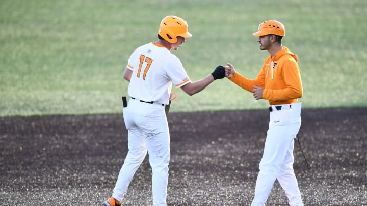 Tennessee’s Jared Dickey (17) celebrates with student assistant coach Ricky Martinez during the NCAA college baseball game against Alabama A&M in Knoxville, Tenn. on Tuesday, February 21, 2023.Ut Baseball Alabama A M