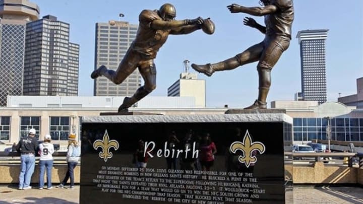 October 7, 2012; New Orleans, LA, USA; A statue titled Rebirth featuring the likeness of former New Orleans Saints safety Steve Gleason blocking a punt by former Atlanta Falcons punter Michael Koenen on September 25, 2006 as seen outside before a game against the San Diego Chargers at the Mercedes-Benz Superdome. Mandatory Credit: Derick E. Hingle-USA TODAY Sports