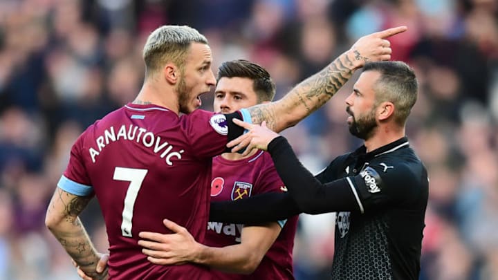 LONDON, ENGLAND - NOVEMBER 03: Marko Arnautovic of West Ham United argues with Steven Defour of Burnley during the Premier League match between West Ham United and Burnley FC at London Stadium on November 3, 2018 in London, United Kingdom. (Photo by Alex Broadway/Getty Images)
