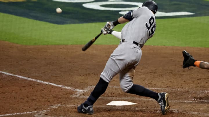 HOUSTON, TEXAS - OCTOBER 20: Aaron Judge #99 of the New York Yankees hits a fly ball against the Houston Astros during the eighth inning in game two of the American League Championship Series at Minute Maid Park on October 20, 2022 in Houston, Texas. (Photo by Bob Levey/Getty Images)