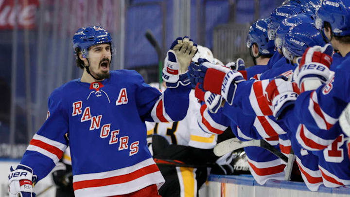 NEW YORK, NEW YORK - FEBRUARY 01: Chris Kreider #20 of the New York Rangers celebrates with teammates after scoring a goal during the third period against the Pittsburgh Penguins at Madison Square Garden on February 01, 2021 in New York City. The Rangers won 3-1. (Photo by Sarah Stier/Getty Images)