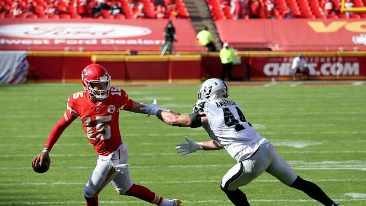 Patrick Mahomes #15 of the Kansas City Chiefs is pursued by Nick Kwiatkoski #44 of the Las Vegas Raiders during the fourth quarter (Photo by Jamie Squire/Getty Images)