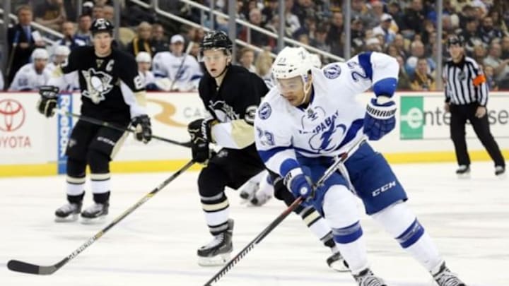 Feb 20, 2016; Pittsburgh, PA, USA; Tampa Bay Lightning right wing J.T. Brown (23) carries the puck against the Pittsburgh Penguins during the third period at the CONSOL Energy Center. Tampa Bay won 4-2. Mandatory Credit: Charles LeClaire-USA TODAY Sports