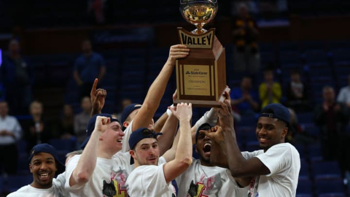 ST. LOUIS, MO - MARCH 4: Members of the Loyola Ramblers hold the Missouri Valley Conference Champions trophy after beating the Illinois State Redbirds during the Missouri Valley Conference Basketball Tournament Championship at the Scottrade Center on March 4, 2018 in St. Louis, Missouri. (Photo by Dilip Vishwanat/Getty Images)