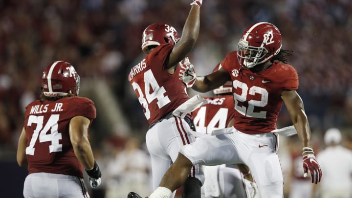 ORLANDO, FL – SEPTEMBER 01: Najee Harris #22 of the Alabama Crimson Tide celebrates with Damien Harris #34 after a one-yard touchdown run in the second quarter of the game against the Louisville Cardinals at Camping World Stadium on September 1, 2018 in Orlando, Florida. (Photo by Joe Robbins/Getty Images)