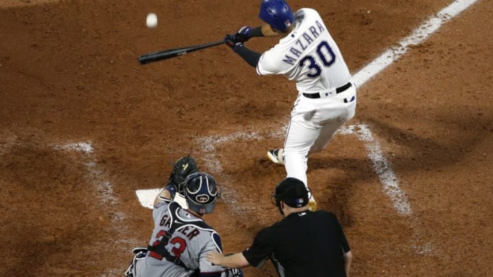 ARLINGTON, TX - AUGUST 31: Nomar Mazara #30 of the Texas Rangers hits a three run home run against the Minnesota Twins during the fourth inning at Globe Life Park in Arlington on August 31, 2018 in Arlington, Texas. (Photo by Ron Jenkins/Getty Images)