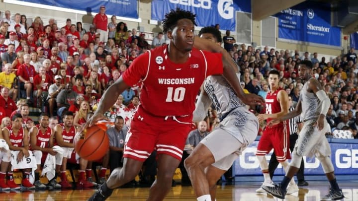 Nov 22, 2016; Lahaina, Maui, HI, USA; Wisconsin Badgers forward Nigel Hayes (10) drives to the basket against Georgetown Hoyas guard Rodney Pryor (23) during the Maui Jim Maui Invitational at the Lahaina Civic Center. Mandatory Credit: Brian Spurlock-USA TODAY Sports