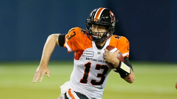 DraftKings: TORONTO, ON - JULY 06: Mike Reilly #13 of the BC Lions scrambles for yards against the Toronto Argonauts at BMO Field on July 6, 2019 in Toronto, Canada. BC defeated Toronto 18-17. (Photo by John E. Sokolowski/Getty Images)