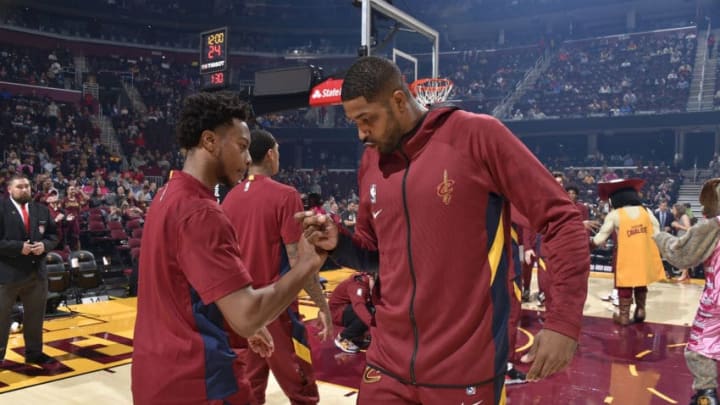 Cleveland Cavaliers guard Darius Garland (left) and Cleveland big Tristan Thompson give each other a high-five. (Photo by David Liam Kyle/NBAE via Getty Images)