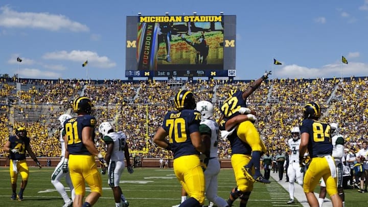 Sep 3, 2016; Ann Arbor, MI, USA; Michigan Wolverines running back Karan Higdon (22) celebrates his touchdown with teammates in the second half against the Hawaii Warriors at Michigan Stadium. Mandatory Credit: Rick Osentoski-USA TODAY Sports