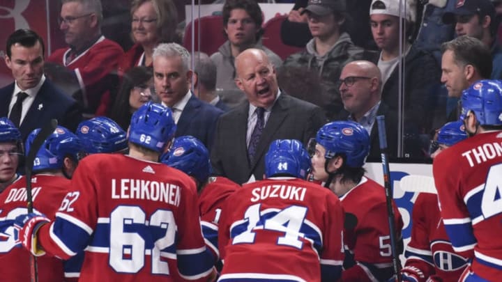 MONTREAL, QC - NOVEMBER 26: Head coach of the Montreal Canadiens Claude Julien talks to players during a time-out against the Boston Bruins during the second period at the Bell Centre on November 26, 2019 in Montreal, Canada. (Photo by Minas Panagiotakis/Getty Images)