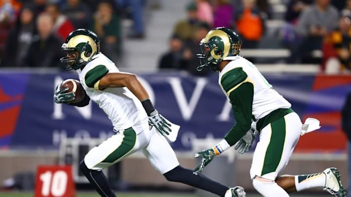 Dec 29, 2015; Tucson, AZ, USA; Colorado State Rams wide receiver Jordon Vaden (left) returns a kick off in front of teammate Kevin Nutt Jr. against the Nevada Wolf Pack in the Arizona Bowl at Arizona Stadium. Nevada defeated Colorado State 28-23. Mandatory Credit: Mark J. Rebilas-USA TODAY Sports