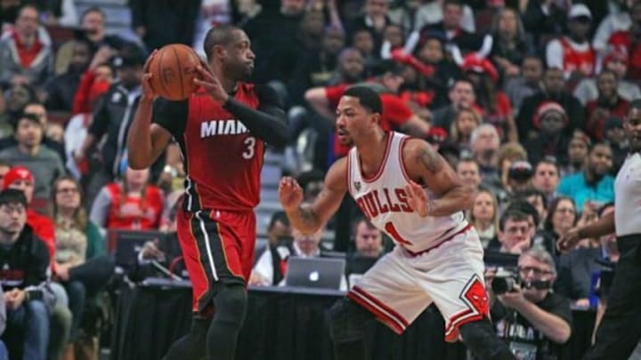 Jan 25, 2016; Chicago, IL, USA; Miami Heat guard Dwyane Wade (3) is defended by Chicago Bulls guard Derrick Rose (1) during the first quarter at the United Center. Mandatory Credit: Dennis Wierzbicki-USA TODAY Sports