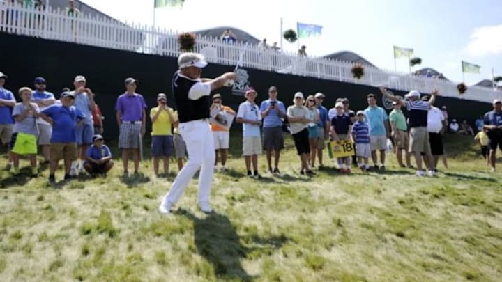 Aug 12, 2015; Sheboygan, WI, USA; Darren Clarke hits from the rough of the 18th hole during a practice round for the 2015 PGA Championship golf tournament at Whistling Straits -The Straits Course. Mandatory Credit: Thomas J. Russo-USA TODAY Sports