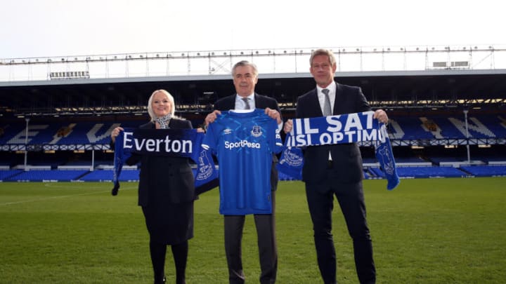 LIVERPOOL, ENGLAND - DECEMBER 23: Carlo Ancelotti poses alongside Marcel Brands (R) and Denise Barrett-Baxendale (L) during his unveiling as new Everton Manager at Goodison Park on December 23, 2019 in Liverpool, England. (Photo by Jan Kruger/Getty Images)