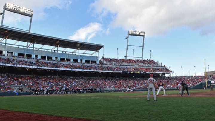 Omaha, NE - JUNE 26: Pitcher Luke Heimlich #15 of the Oregon State Beavers delivers a pitch in the third inning during game one of the College World Series Championship Series against the Arkansas Razorbacks on June 26, 2018 at TD Ameritrade Park in Omaha, Nebraska. (Photo by Peter Aiken/Getty Images)