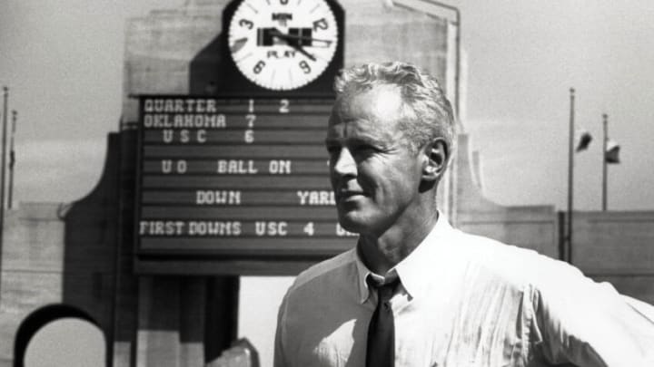 Sep 28, 1963; Los Angeles, CA, USA; FILE PHOTO; Oklahoma Sooners head coach Bud Wilkinson action against USC Trojans defensive tackle (78) Mac Byrd. Mandatory Credit: David Boss-USA TODAY Sports © Copyright David Boss