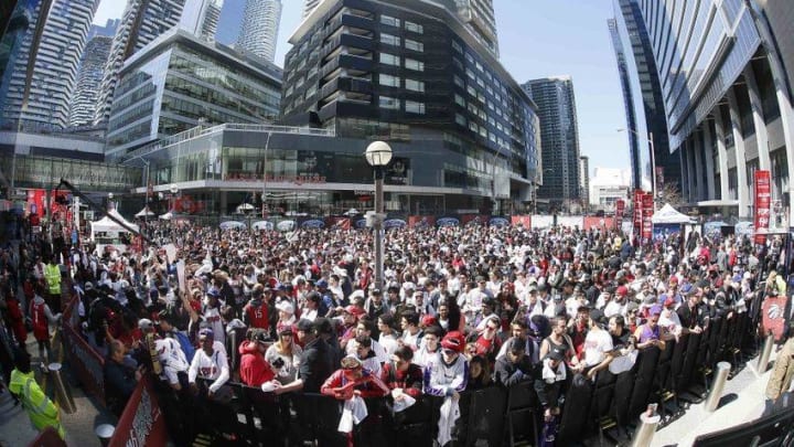 Apr 16, 2016; Toronto, Ontario, CAN; Toronto Raptors fans in the area know as Jurassic Park outside of the Air Canada Centre prior to game one of the first round of the 2016 NBA Playoffs between the Indiana Pacers and Toronto Raptors. Mandatory Credit: John E. Sokolowski-USA TODAY Sports