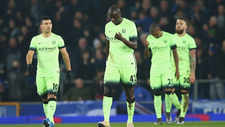 LIVERPOOL, ENGLAND - JANUARY 06: Yaya Toure of Manchester City looks dejected with team mates after the opening goal scored by Ramiro Funes Mori of Everton during the Capital One Cup Semi Final First Leg match between Everton and Manchester City at Goodison Park on January 6, 2016 in Liverpool, England. (Photo by Alex Livesey/Getty Images)