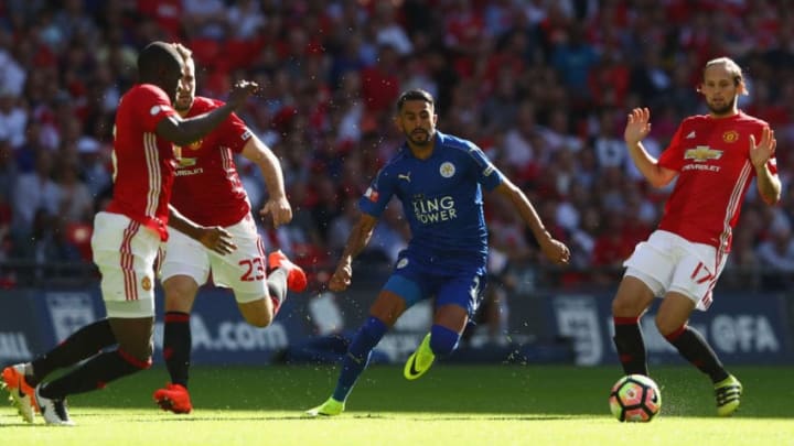 LONDON, ENGLAND - AUGUST 07: Riyad Mahrez of Leicester City cuts between Eric Bailly (L), Luke Shaw (2L) and Daley Blind (R) of Manchester United during the Community Shield match between Leicester City and Manchester United at Wembley Stadium on August 7, 2016 in London, England. (Photo by Michael Steele/Getty Images)