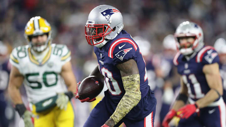 FOXBOROUGH, MA - NOVEMBER 04: Josh Gordon #10 of the New England Patriots runs with the ball on his way to scoring a 55-yard receiving touchdown during the fourth quarter against the Green Bay Packers at Gillette Stadium on November 4, 2018 in Foxborough, Massachusetts. (Photo by Maddie Meyer/Getty Images)