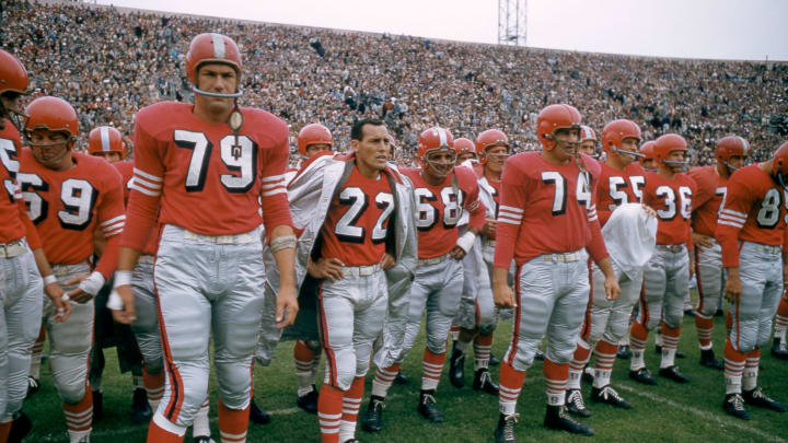 SAN FRANCISCO, CA – AUGUST 19: Bob St. Clair #79, Joe Arenas #22 and Bob Toneff #74 of the San Francisco 49ers stand on the sideline during an NFL game against the Cleveland Browns on August 19, 1956 at Kezar Stadium in San Francisco, California. (Photo by Hy Peskin/Getty Images) (Set Number: X4022)