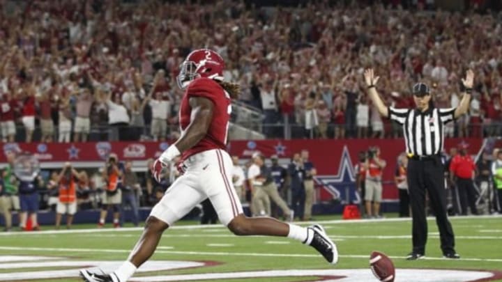 Sep 5, 2015; Arlington, TX, USA; Alabama Crimson Tide running back Derrick Henry (2) scores a touchdown against the Wisconsin Badgers during the first quarter at AT&T Stadium. Mandatory Credit: Tim Heitman-USA TODAY Sports