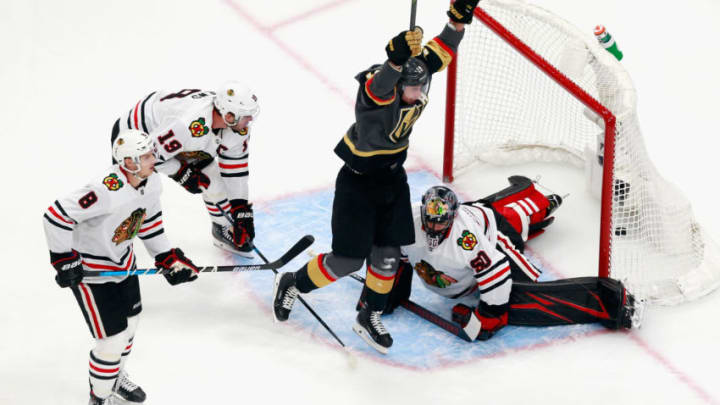 Reilly Smith #19 of the Vegas Golden Knights scores the game-winning goal at 7:13 of overtime against the Chicago Blackhawks to win the game 4-3 in Game Two of the Western Conference First Round during the 2020 NHL Stanley Cup Playoffs. (Photo by Jeff Vinnick/Getty Images)