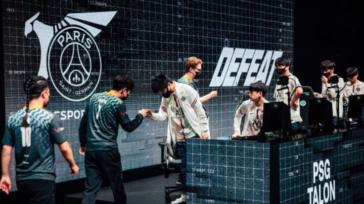 BUSAN, SOUTH KOREA - MAY 24: Teams Evil Geniuses and PSG Talon greet onstage after their match at the League of Legends - Mid-Season Invitational Rumble Stage on May 24, 2022 in Busan, South Korea. (Photo by Colin Young-Wolff/Riot Games)