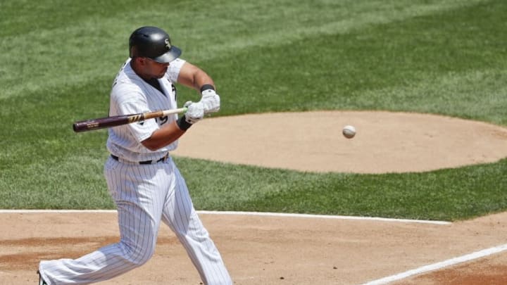 Jun 11, 2016; Chicago, IL, USA; Chicago White Sox first baseman Jose Abreu (79) hits a single off Kansas City Royals relief pitcher Danny Duffy (not pictured) during the first inning at U.S. Cellular Field. Mandatory Credit: Kamil Krzaczynski-USA TODAY Sports