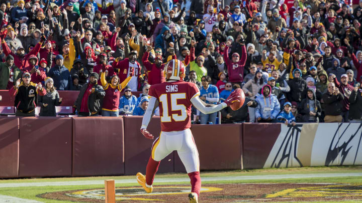 LANDOVER, MD – NOVEMBER 24: Steven Sims #15 of the Washington Football Team celebrates as he returns a kick for a touchdown against the Detroit Lions during the first half at FedExField on November 24, 2019 in Landover, Maryland. (Photo by Scott Taetsch/Getty Images)