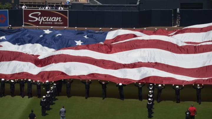 SAN DIEGO, CA – MARCH 28: U.S. Navy sailors bring a giant American flag onto the field before the game between the San Diego Padres and the San Francisco Giants on Opening Day at Petco Park March 28, 2019 in San Diego, California. (Photo by Denis Poroy/Getty Images)