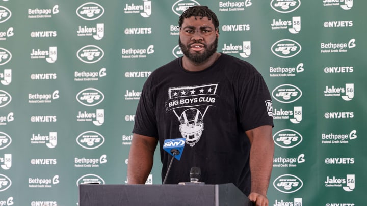 Jul 27, 2021; Florham Park, NJ, United States; New York Jets offensive tackle Mekhi Becton (77) talks with the media on training camp report day at Atlantic Health Jets Training Center. Mandatory Credit: Vincent Carchietta-USA TODAY Sports