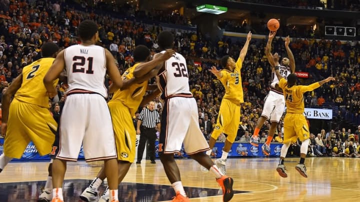 Dec 20, 2014; St. Louis, MO, USA; Illinois Fighting Illini guard Rayvonte Rice (24) shoots the ball for the game winning three pointer against the Missouri Tigers during the second half at Scottrade Center. The Illinois Fighting Illini defeat the Missouri Tigers 62-59. Mandatory Credit: Jasen Vinlove-USA TODAY Sports