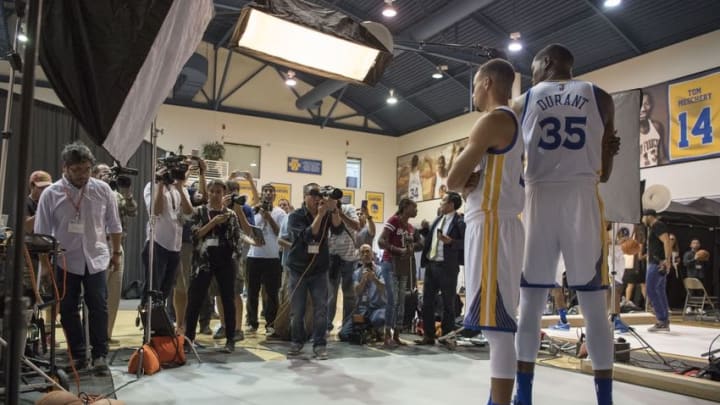 September 26, 2016; Oakland, CA, USA; Golden State Warriors guard Stephen Curry (30) and forward Kevin Durant (35) pose for a photo during media day at the Warriors Practice Facility. Mandatory Credit: Kyle Terada-USA TODAY Sports