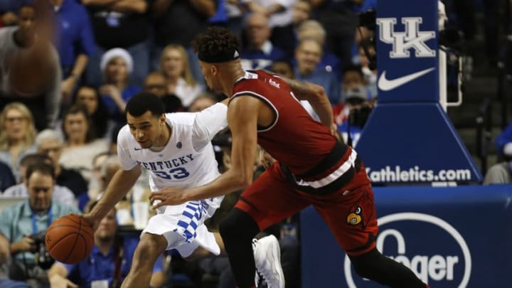 Dec 26, 2015; Lexington, KY, USA; Kentucky Wildcats guard Jamal Murray (23) brings the ball down court during the second half against the Louisville Cardinals guard Damion Lee (0) at Rupp Arena. Kentucky won 75-73. Mandatory Credit: Frank Victores-USA TODAY Sports