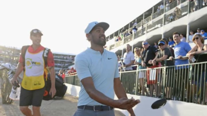 SCOTTSDALE, AZ – FEBRUARY 02: Tony Finau hands out “BEATS” headphones on the 16th hole during the second round of the Waste Management Phoenix Open at TPC Scottsdale on February 2, 2018 in Scottsdale, Arizona. (Photo by Robert Laberge/Getty Images)