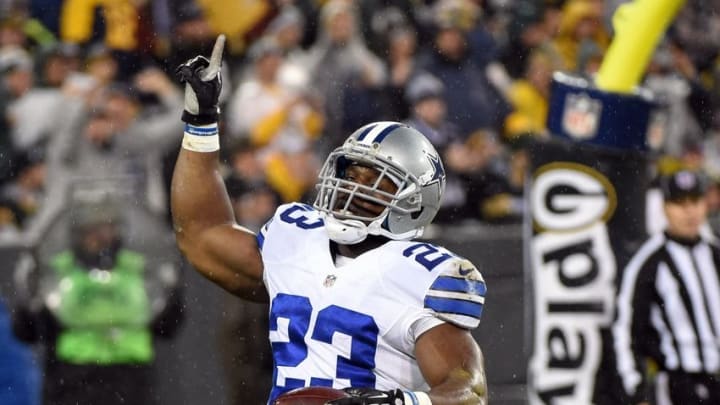 Dec 13, 2015; Green Bay, WI, USA; Dallas Cowboys running back Robert Turbin (23) reacts after scoring a touchdown in the third quarter during the game against the Green Bay Packers at Lambeau Field. Mandatory Credit: Benny Sieu-USA TODAY Sports