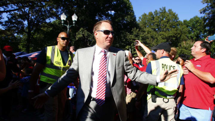 OXFORD, MS - OCTOBER 29: Mississippi Rebels head coach Hugh Freeze greets fans as they walk down the Walk of Champions in the Grove before an NCAA college football game against the Auburn Tigers on October 29, 2016 in Oxford, Mississippi. (Photo by Butch Dill/Getty Images)