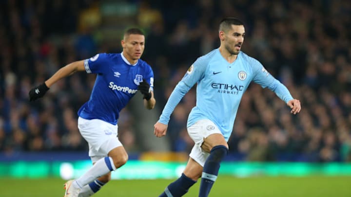 LIVERPOOL, ENGLAND - FEBRUARY 06: Ilkay Gundogan of Manchester City beats Richarlison of Everton FC during the Premier League match between Everton FC and Manchester City at Goodison Park on February 06, 2019 in Liverpool, United Kingdom. (Photo by Alex Livesey/Getty Images)