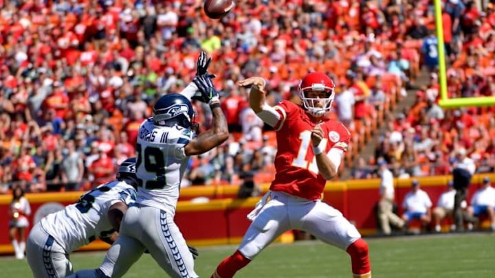 Aug 13, 2016; Kansas City, MO, USA; Kansas City Chiefs quarterback Alex Smith (11) throws a pass as Seattle Seahawks free safety Earl Thomas (29) defends during the first half at Arrowhead Stadium. Mandatory Credit: Denny Medley-USA TODAY Sports