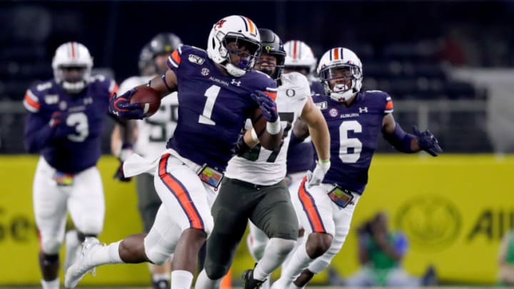 ARLINGTON, TEXAS - AUGUST 31: Big Kat Bryant #1 of the Auburn Tigers returns a fumble against the Oregon Ducks in the second quarter during the Advocare Classic at AT&T Stadium on August 31, 2019 in Arlington, Texas. (Photo by Tom Pennington/Getty Images)