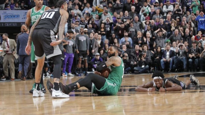 SACRAMENTO, CA - MARCH 6: Marcus Morris #13 of the Boston Celtics holds onto the ball on the floor during the game against the Sacramento Kings on March 6, 2019 at Golden 1 Center in Sacramento, California. NOTE TO USER: User expressly acknowledges and agrees that, by downloading and or using this photograph, User is consenting to the terms and conditions of the Getty Images Agreement. Mandatory Copyright Notice: Copyright 2019 NBAE (Photo by Rocky Widner/NBAE via Getty Images)
