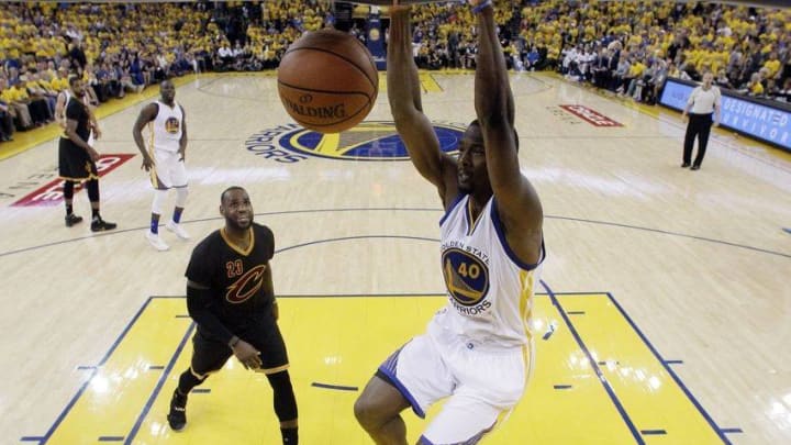 Jun 19, 2016; Oakland, CA, USA; Golden State Warriors forward Harrison Barnes (40) dunks the ball against Cleveland Cavaliers forward LeBron James (23) in game seven of the NBA Finals at Oracle Arena. Mandatory Credit: Marcio Jose Sanchez-Pool Photo via USA TODAY Sports